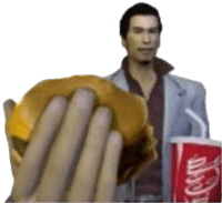 a man holding a hamburger and a coca cola